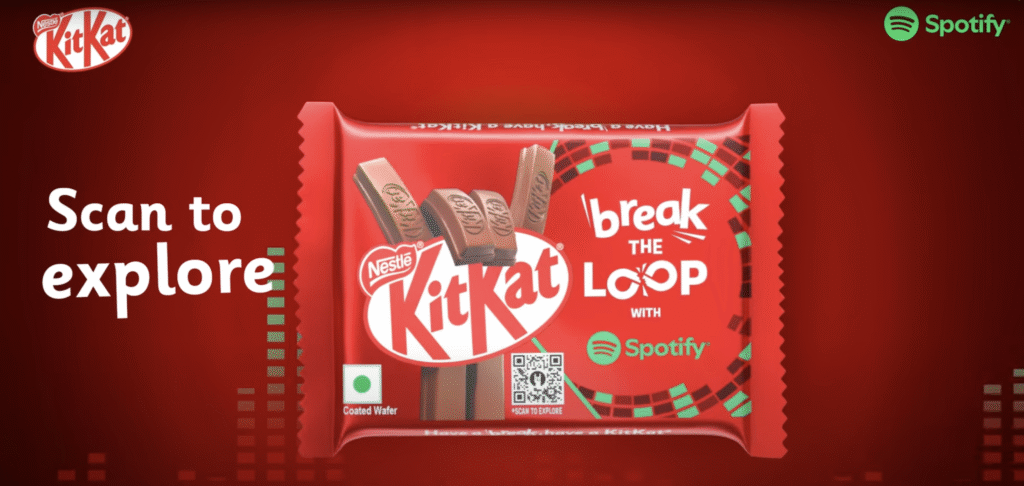 KitKat 'Break The Loop' chocolate bar with visible QR code for Spotify music discovery
