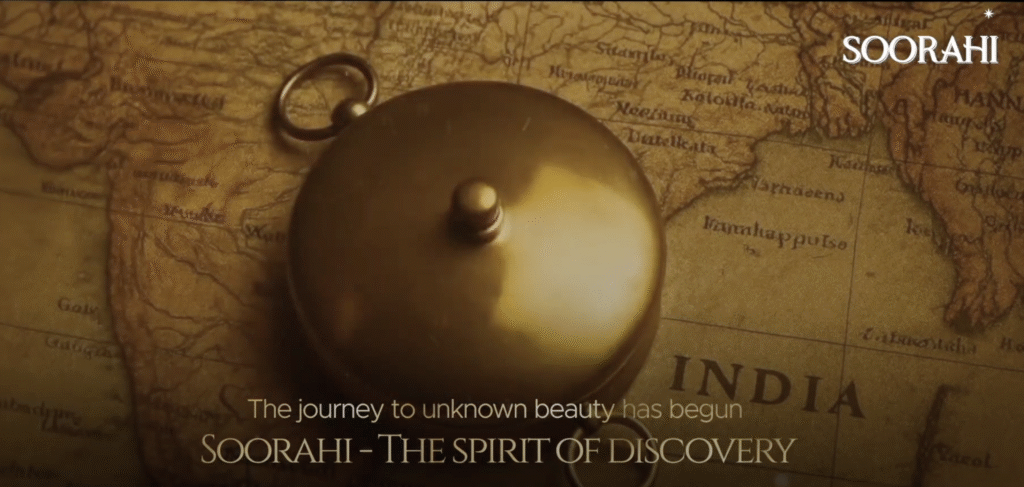 Soorahi whisky compass on vintage India map with tagline "The journey to unknown beauty has begun" representing Spirit of Discovery campaign