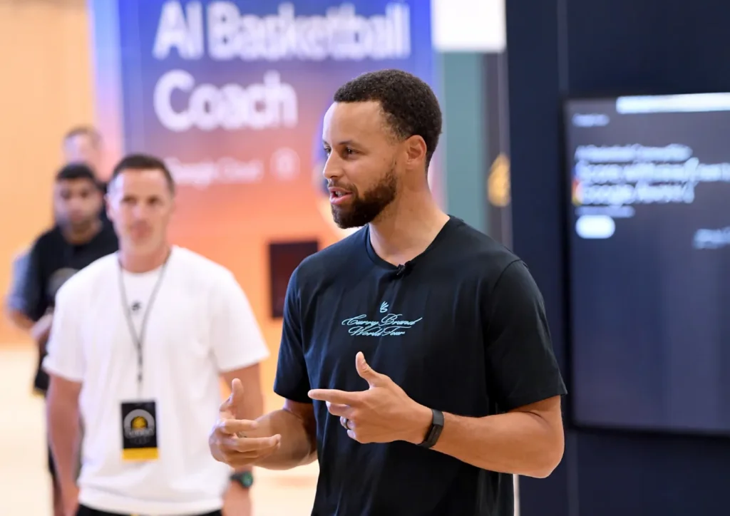 Stephen Curry discussing AI Basketball Coach with Google engineer at Curry Camp”
Title: “Behind the Scenes: Curry and Google Engineers Collaborate